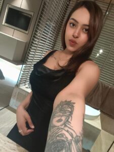 Indian escort near The Suryaa Hotel Delhi in luxury room representing premium private experience